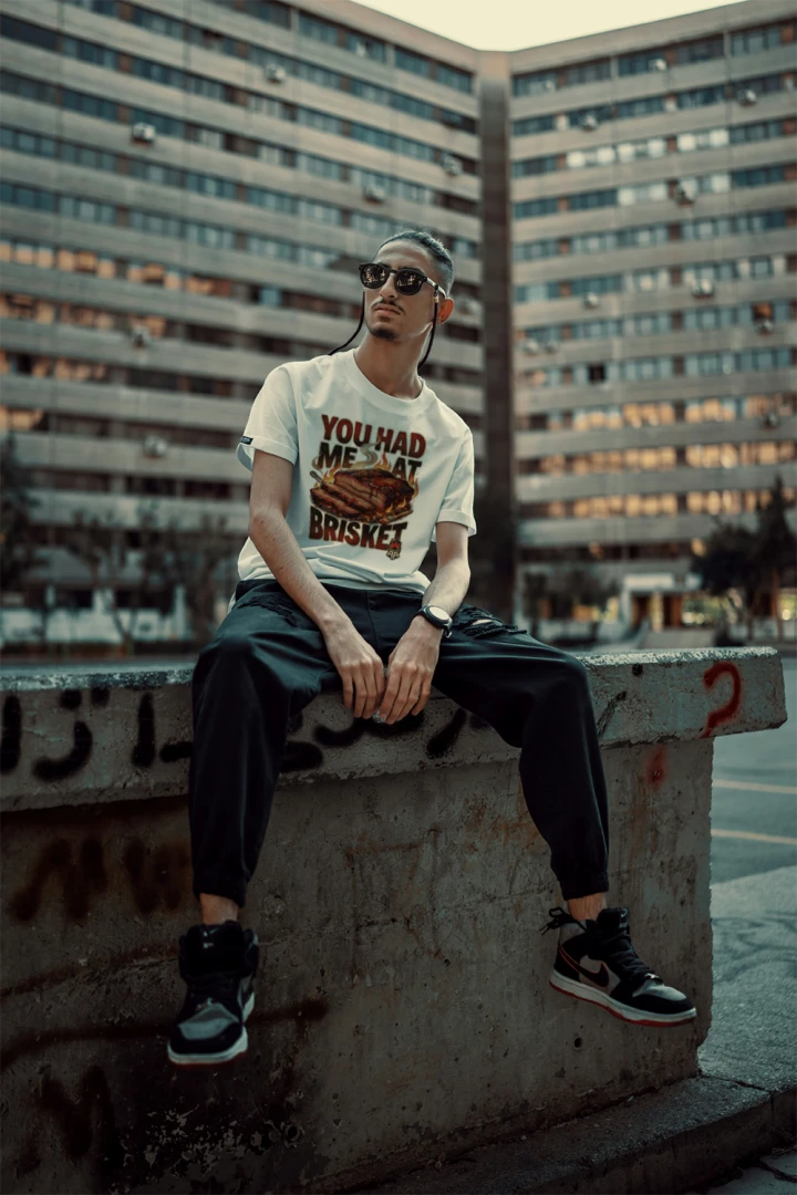 You had me at brisket design T-shirt in -White Colored shirt sitting in front of a bbq building